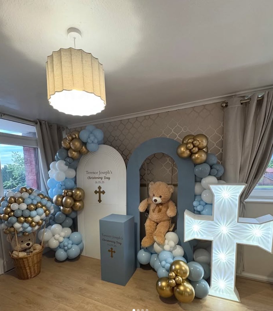 Blue and gold christening decor with arch boards, teddy bear and light-up cross by Ta Luxe Events